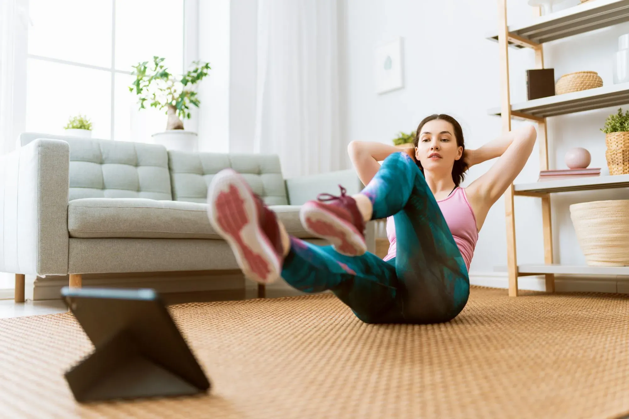 a woman exercising and staying active at home